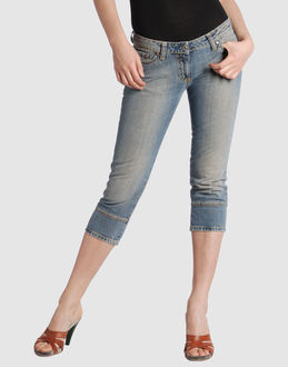 Denim cotton - Delave - Low waisted - Button, zip fly closure - Five pockets - Rear logo - Diamante detailing - Studs -