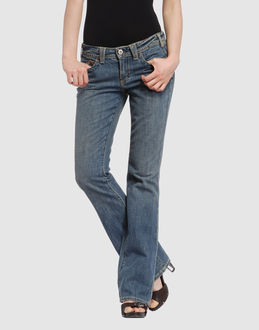 Denim cotton - Low waisted - Button, zip fly closure - Multipockets - Bootleg cut - Slashed detailing - Rear logo - Stitch detailing -