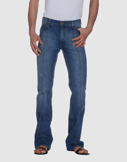 Denim cotton - Belt loops - Button, zip fly closure - Four pockets - Bootleg cut - Rear logo - Studs - Stitched trimmed -