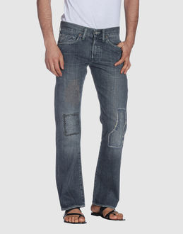 Delave - Denim cotton - Belt loops - Hidden buttons - Five pockets - Bootleg cut - Slashed detailing - Rear logo - Stitched trimmed -