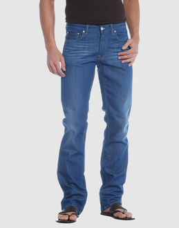 Denim cotton - Belt loops - Button, zip fly closure - Five pockets - Straight leg cut - Rear logo - Studs - Stitched trimmed -