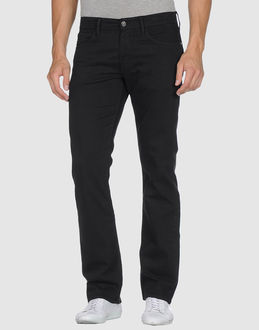 Pantalons jeans - MELTIN POT - Meltin Pot - :.Tissu �lastique Coton denim Jambes droites Taille basse Lavage color� Fermeture avec fermeture �clair et boutons Cinq poches Clous Logo dans le dos Coton denim Tiss� Couleur : Bleu fonc� - Noir , Mati�re : 98% coton, 2% �lasthanne , Taille : 31W-34L - 32W- 