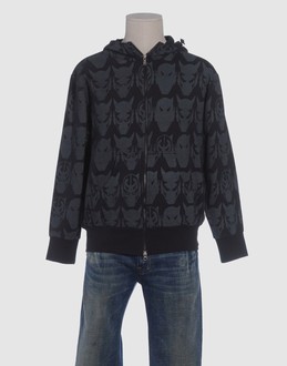 Fleece - Hooded neckline - Zip closure - Two pockets - Partially lined interior - Detailed print - Logo details -