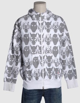 Fleece - Hooded neckline - Zip closure - Two pockets - Partially lined interior - Detailed print - Logo details - Shoe-string laces -