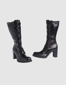 TP - CALZATURE - Stivali - su YOOX.COM