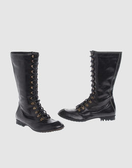 TP - CALZATURE - Stivali - su YOOX.COM