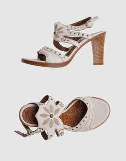 Buckling ankle belt closure - Leather sole - Belt detailing - Embroidery - Stitch detailing -