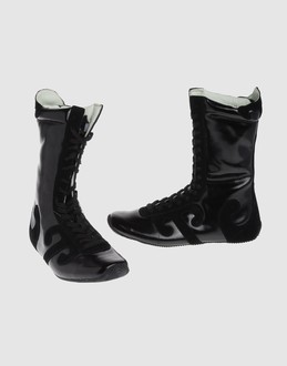 WUSHU SHOES - CALZATURE - Stivali - su YOOX.COM