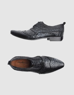 Laced closure - Leather sole - Perforated detailing - Aged-looking leather -