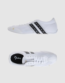 Perforated fabric - Laced closure - Rubber sole - Contrasting applications details - Stitch detailing - Logo details -