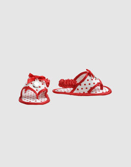 Satin Cloth Polka dots Elasticised gores Logo details Bow detailing Satin Cloth  Textile fibres...