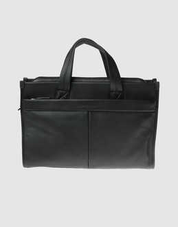 COCCINELLE - BAGAGERIE - Serviettes sur YOOX.COM