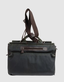 Techno fabric - Zip closure - External side slit pockets - Internal zip pocket - Double handle - Handbags - Contrasting applications -