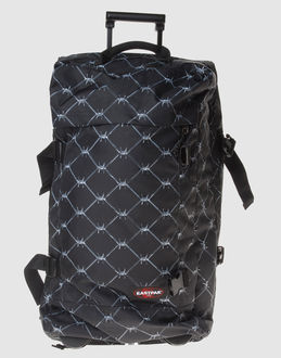 EASTPAK - BAGAGERIE - Valises à roulettes - sur YOOX.COM
